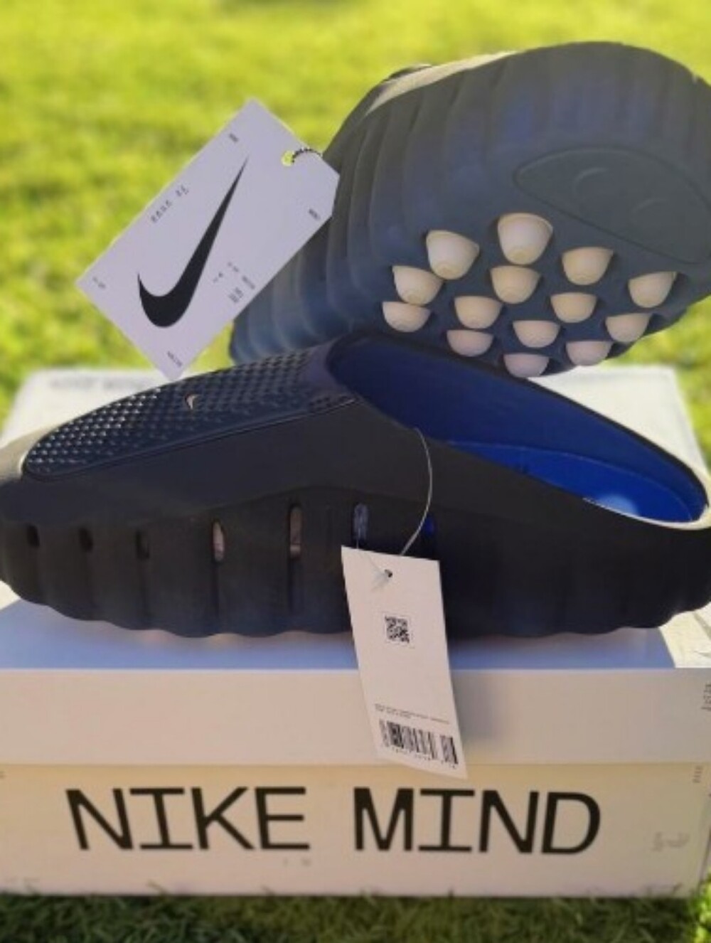 Nike Men's Black Slip-On Sandals with Blue Lining